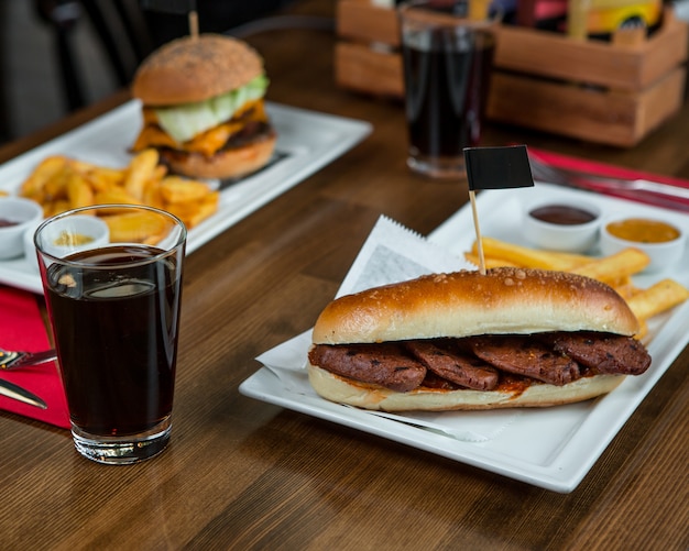 Free photo burgers with steaks and glass of coca cola.