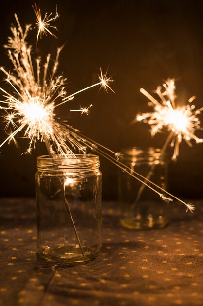 Burning Bengal lights in jars 