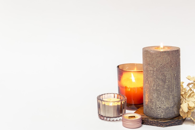 Free Photo burning candles on a white background isolated