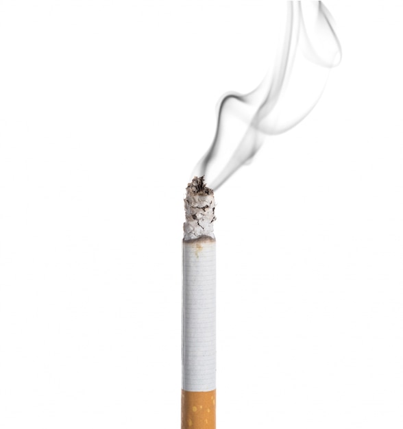 Free photo burning cigarette on white background