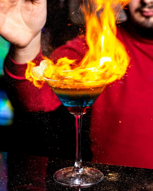 Burning cocktail on the table 1