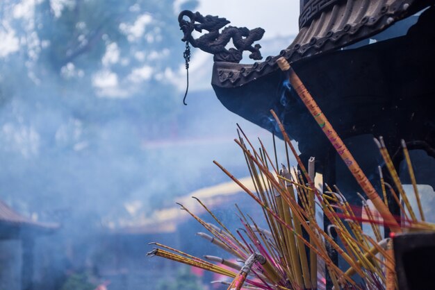 Burning incense in a censer