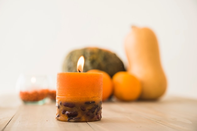 Burning orange candle