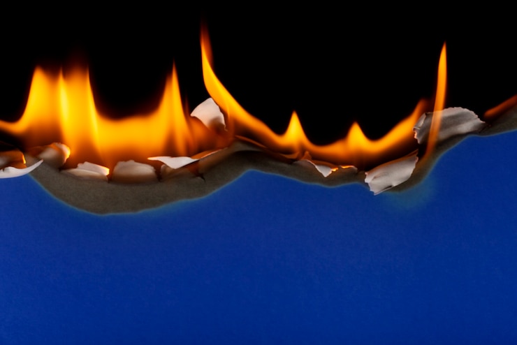 Free Photo burning paper background still life