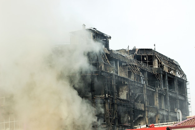 Burning shopping center or mall with smoke