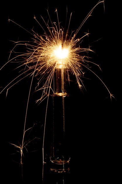 Burning sparkler in bottle