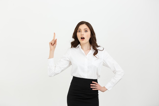 Business concept attractive young caucasian girl open her mouth and pointing her index finger to the