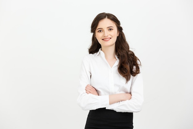 Business concept portrait confident young businesswoman keeping arms crossed and looking at camera w