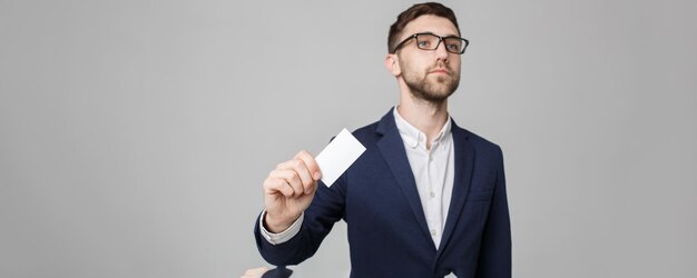 Business Concept Portrait Handsome Business man showing name card with smiling confident face White BackgroundCopy Space