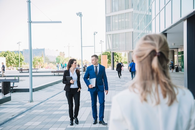 Free photo business couple walking