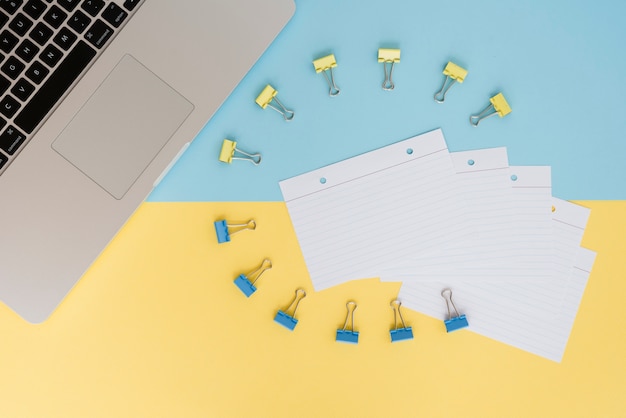 Business desk assortment with paperclips