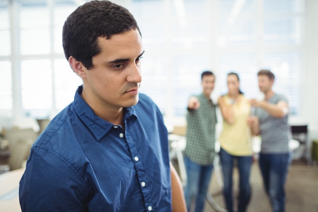 Free photo business executive making fun of colleague