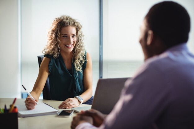 Business executives interacting with each other