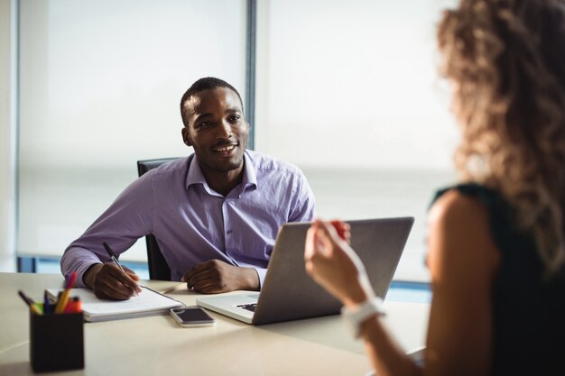 Business executives interacting with each other