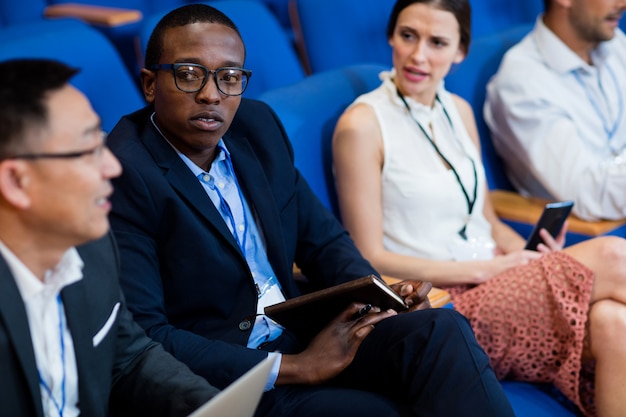 Business executives participating in a business meeting