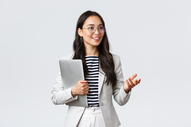 Business, Finance And Employment, Female Successful Entrepreneurs Concept. Smiling Professional Businesswoman, Real Estate Broker Showing Clients Good Deal, Carry Laptop In Hand