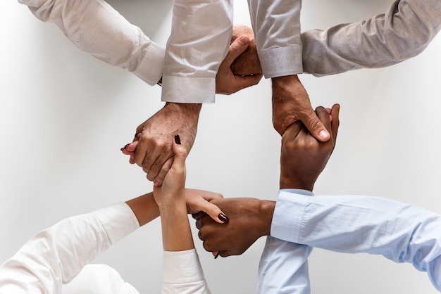 Business hands joined together teamwork Free Photo