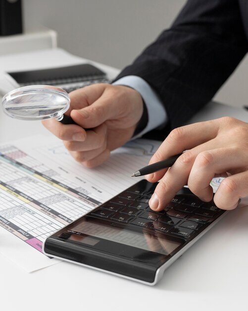 Free photo business man calculating finance numbers