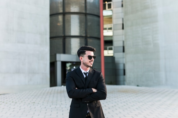 Business man in front of the office building