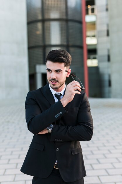 Business man in front of the office building