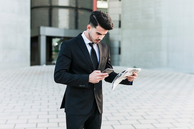 Business man in front of the office building