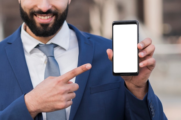 Business man holding mobile