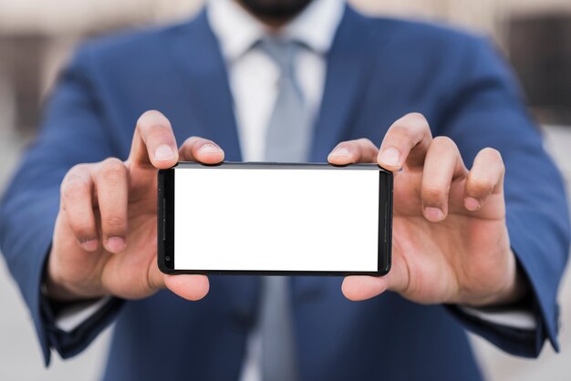 Business man holding phone