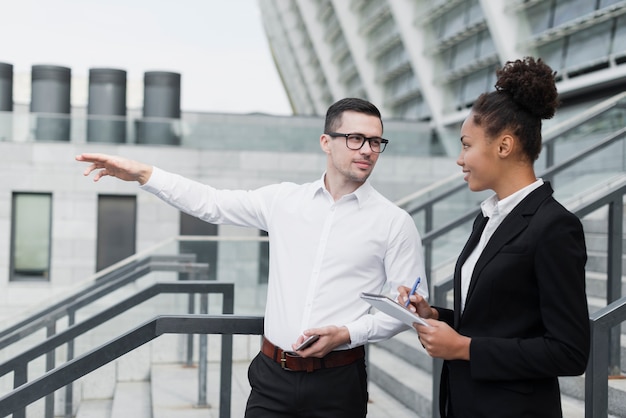 Business man pointing at something