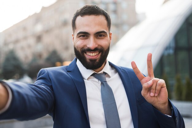 Business man showing ok sign