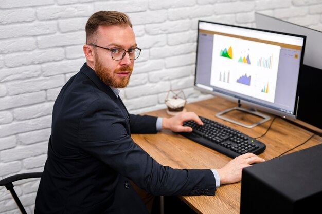 Business man sitting at desk