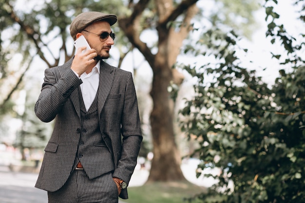 Business man in suit with phone