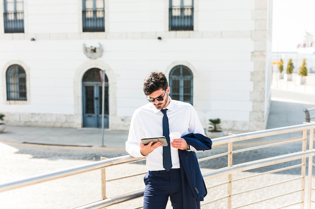 Business man using his tablet