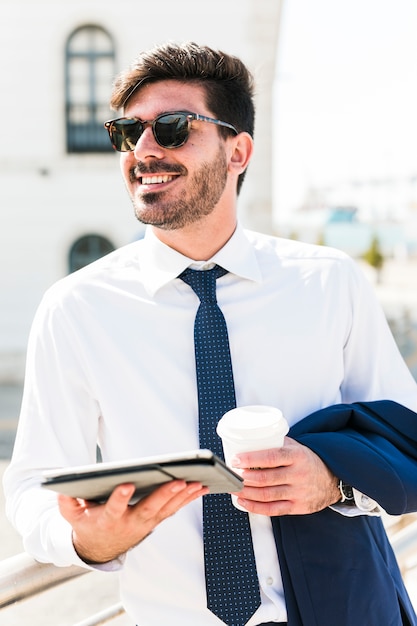 Business man using his tablet