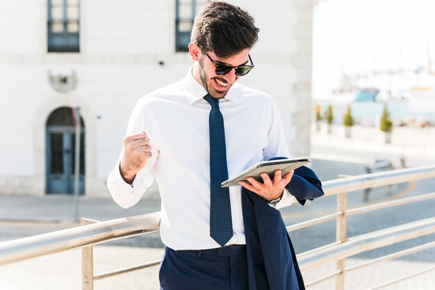 Business man using his tablet