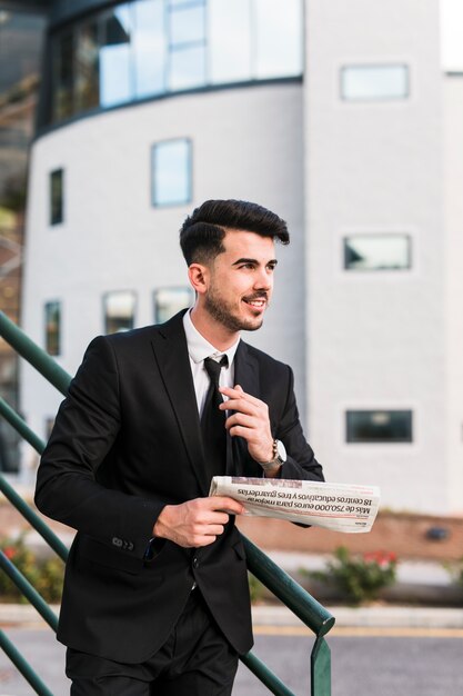 Business man with newspaper