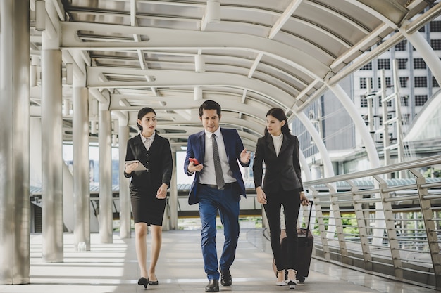 Business man and woman are going on business trip.