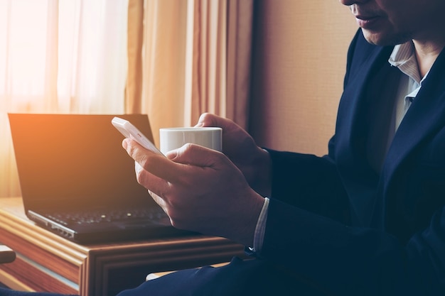 Business man working in hotel room