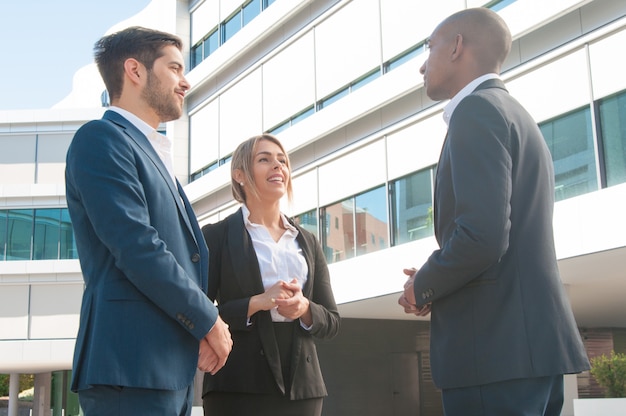 Business meeting of sales manager and couple of customers