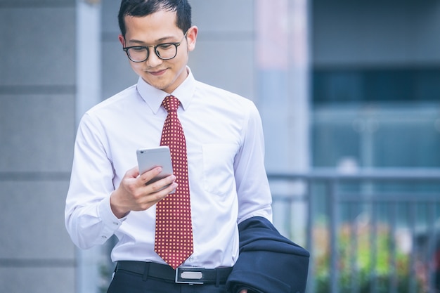 Business men answer phones at the office door