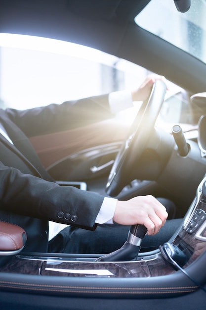 Business men drive side photos of cars