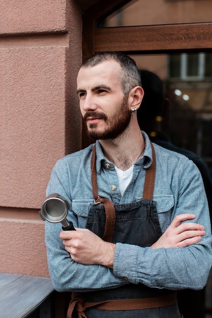 Business owner with apron on break