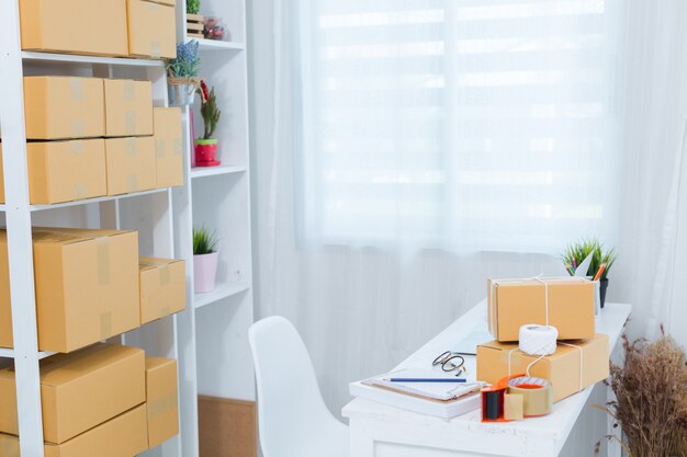 business owner working at home office packaging