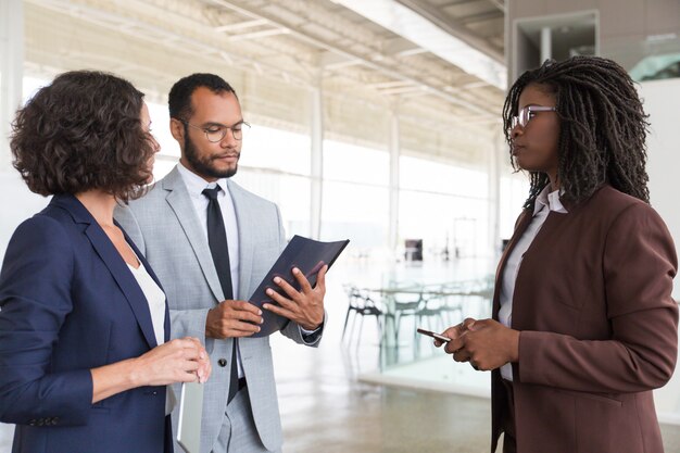 Business partners discussing contract terms