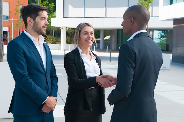 Free photo business partners greeting each other