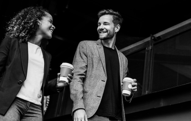 Free photo business partners having take away coffee