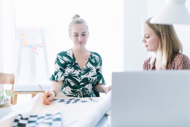 Business partners planning work during meeting