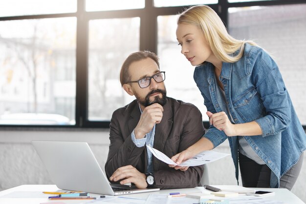 Business partners working in office