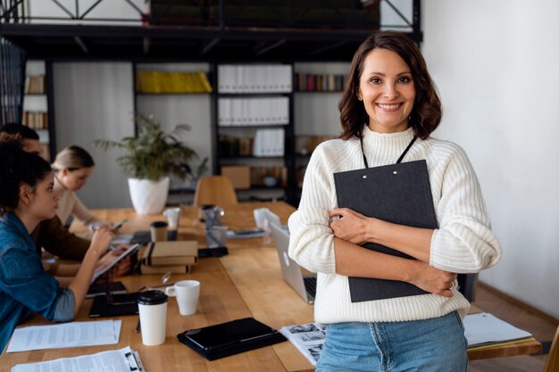 Business people in conference room medium shot