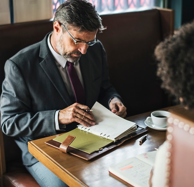 Business people discussing in the cafe