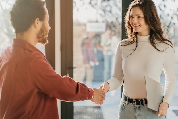 Business people hand shake